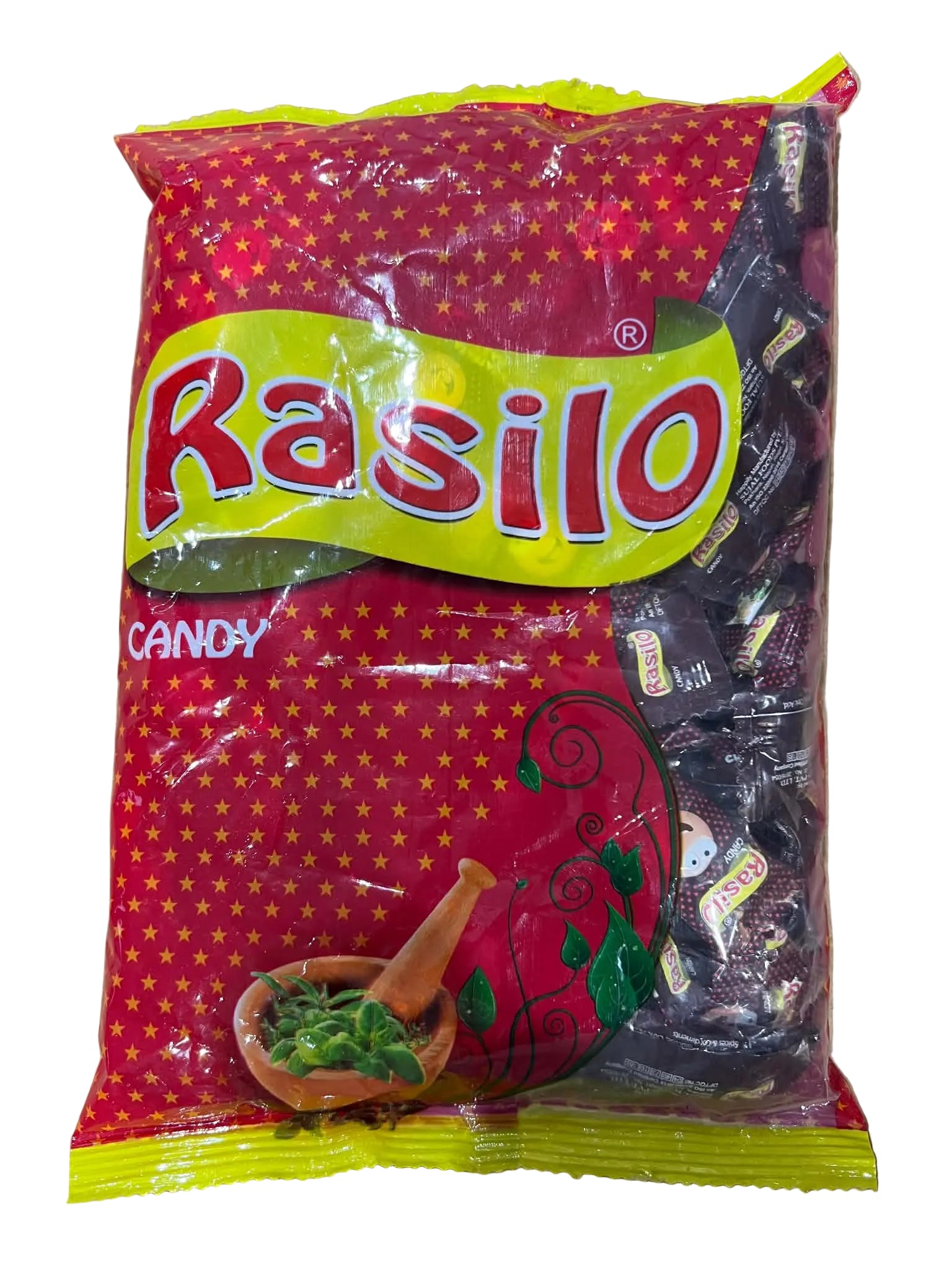 A bag of Rasilo Candy, featuring a bright red and yellow packaging design with illustrations of green candies, shown on a neutral cardboard background.