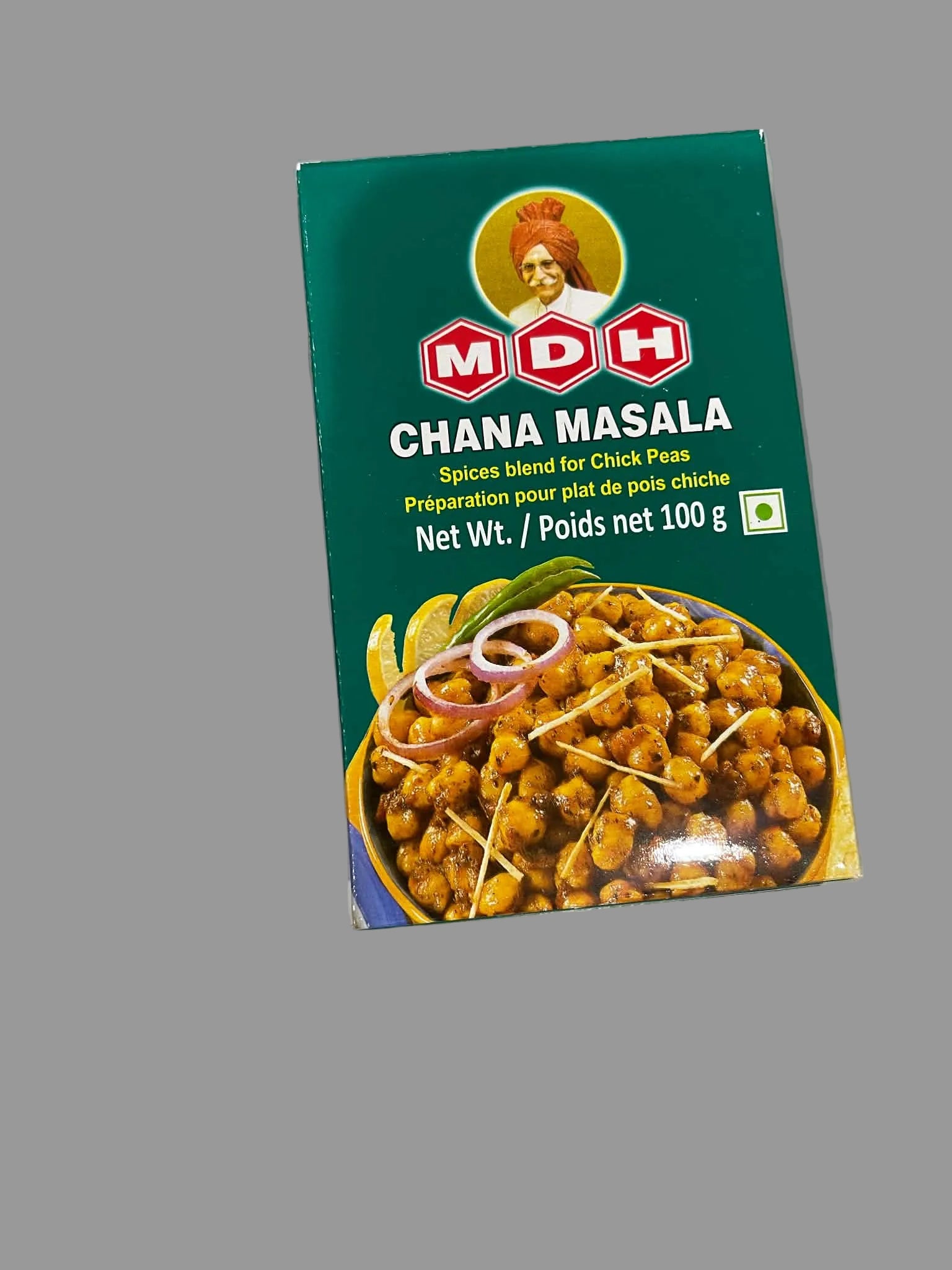 A box of MDH Chana Masala spice blend for chick peas, featuring a dark green background with the MDH logo and a photo of the prepared chick pea dish on the front.