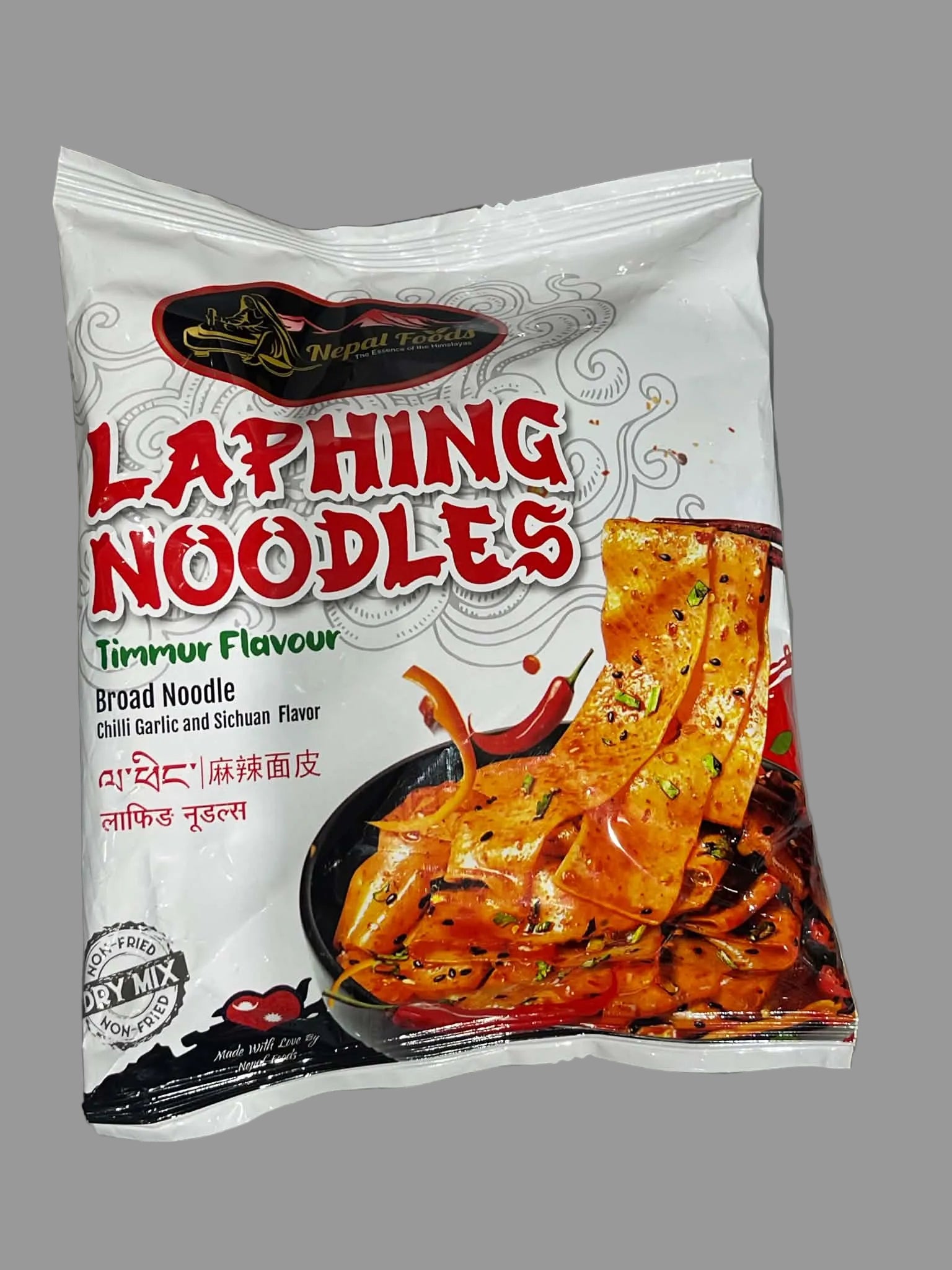 A package of Nepal Taste Laphing Noodles in Timmur Flavour, featuring a white bag with bold red and green text and a photo of spicy red noodles on a gray background.