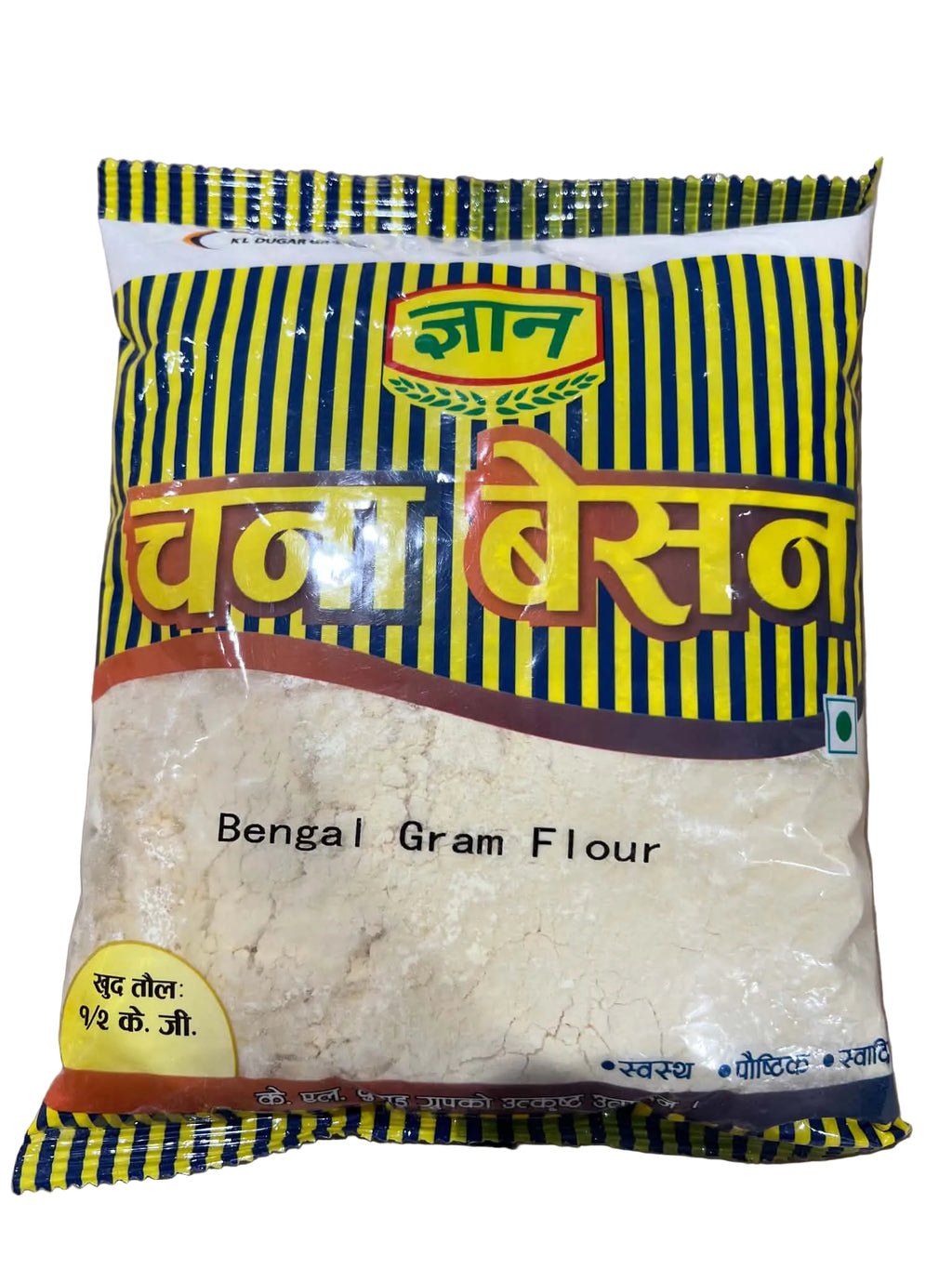 A bag of Jai Baba's Bengal Gram Flour (Indian Rice Flour) on a plain brown surface. The packaging features a yellow and blue striped design with Hindi text and a clear window showing the off-white flour inside.