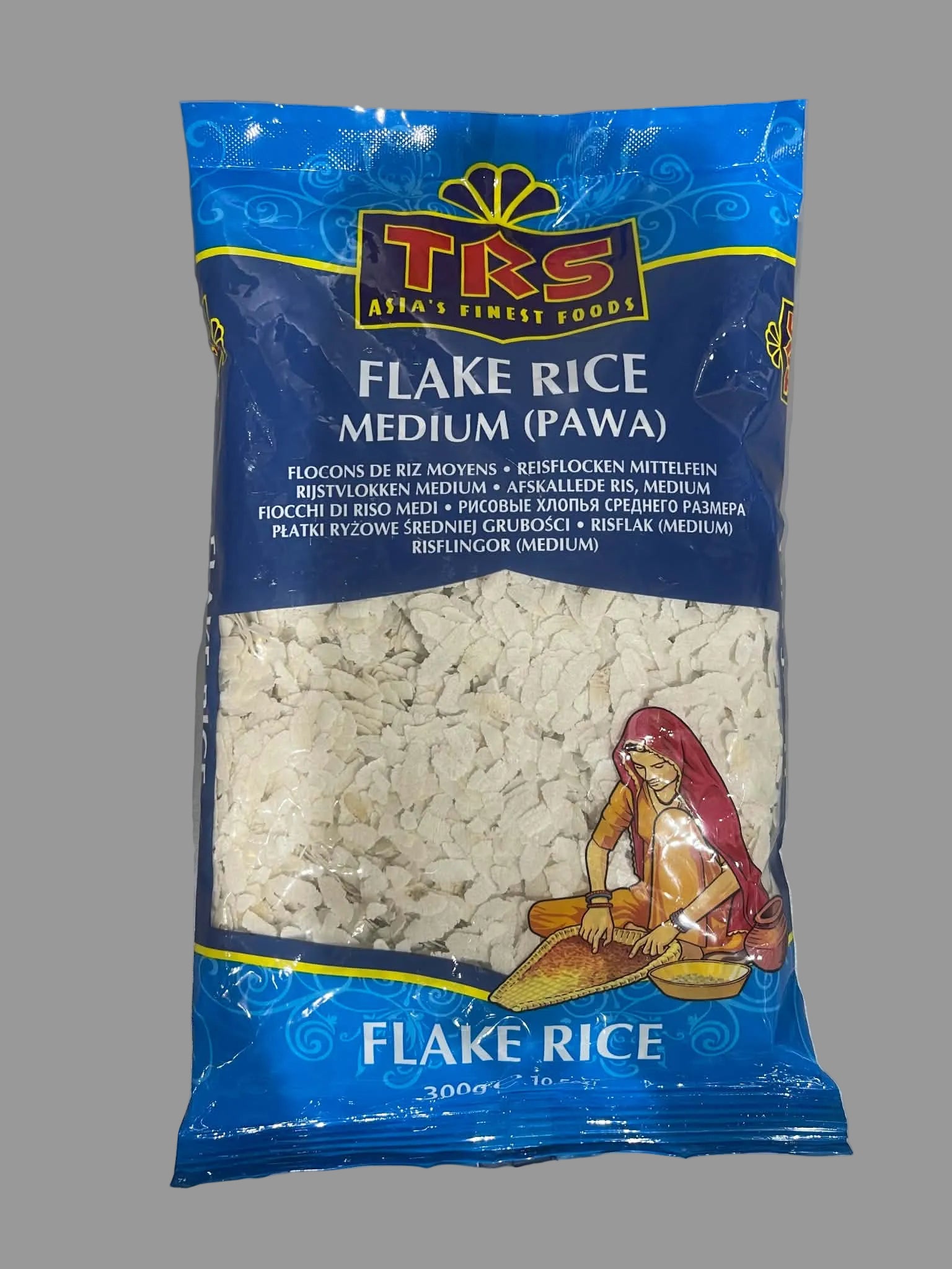 A 300g package of TKS Atta Finest Foods Flake Rice in medium (Pawa) size, featuring a blue bag with a clear window showing the white rice flakes inside.