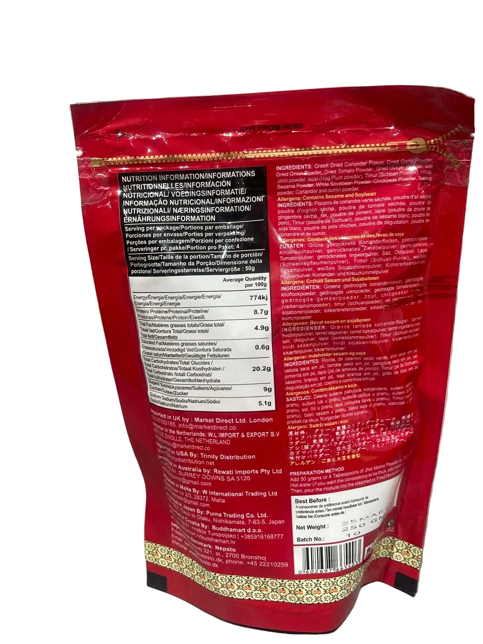 The back of a red stand-up pouch package, showing nutritional facts, ingredients, and product details in multiple languages, photographed on a light gray surface.