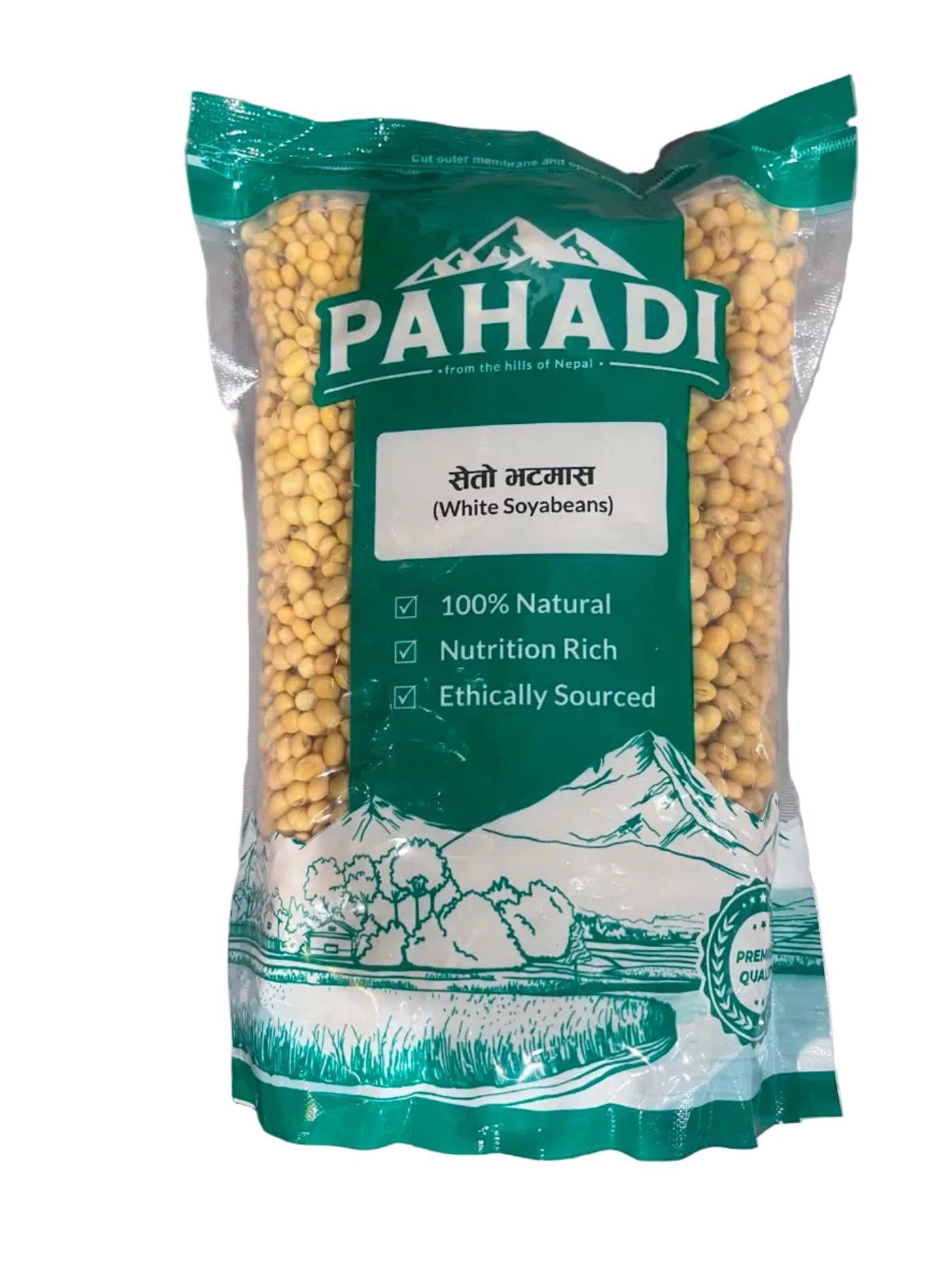 A bag of Pahadi Organic Whole Soybeans on a light gray surface. The packaging is green and white with illustrations of a tractor and a field, and the soybeans are visible through clear windows in the bag.