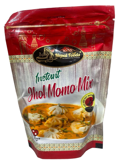A stand-up pouch of Nepal Foods Instant Jhol Momo Mix, featuring a red and white design with a bowl of soup and dumplings printed on the front.
