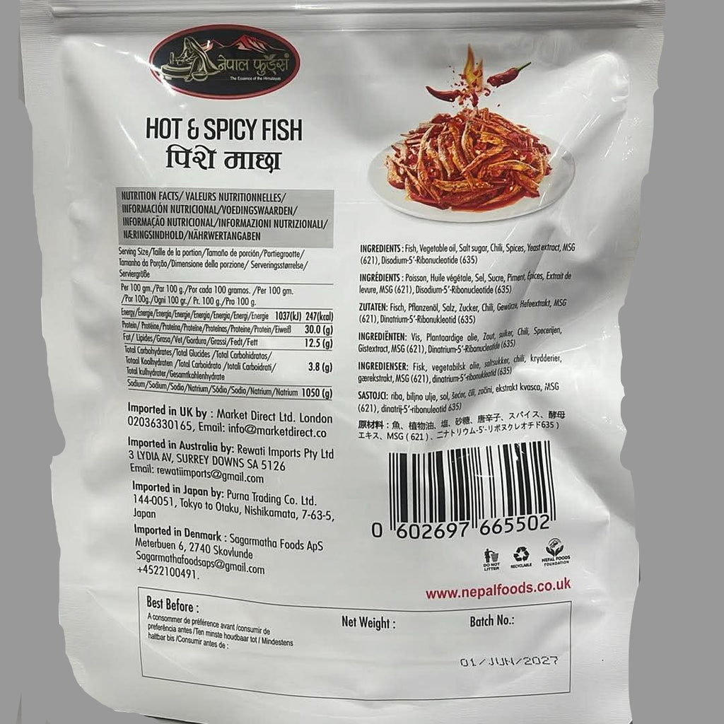 The back of a white resealable pouch of Neelp Foods Hot & Spicy Fish, showing product details, ingredients, and a barcode on a reflective gray surface.
