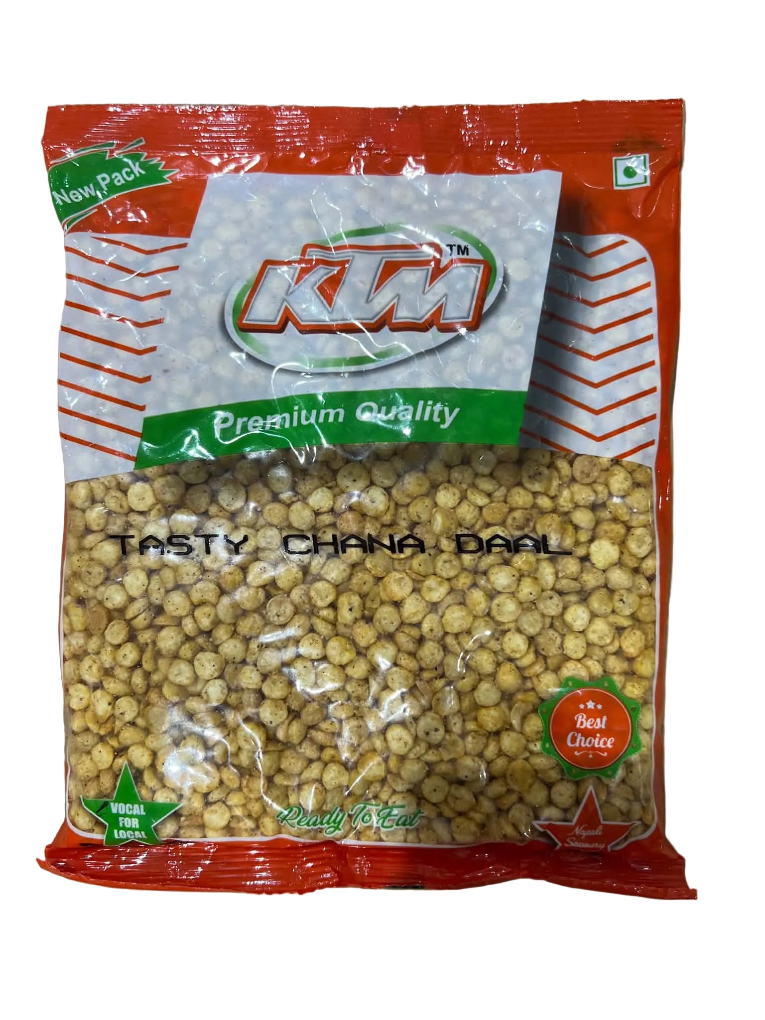A bag of KUM Tasty Chana Dal (split chickpeas) in its original red, white, and green packaging, placed on a brown cardboard surface.