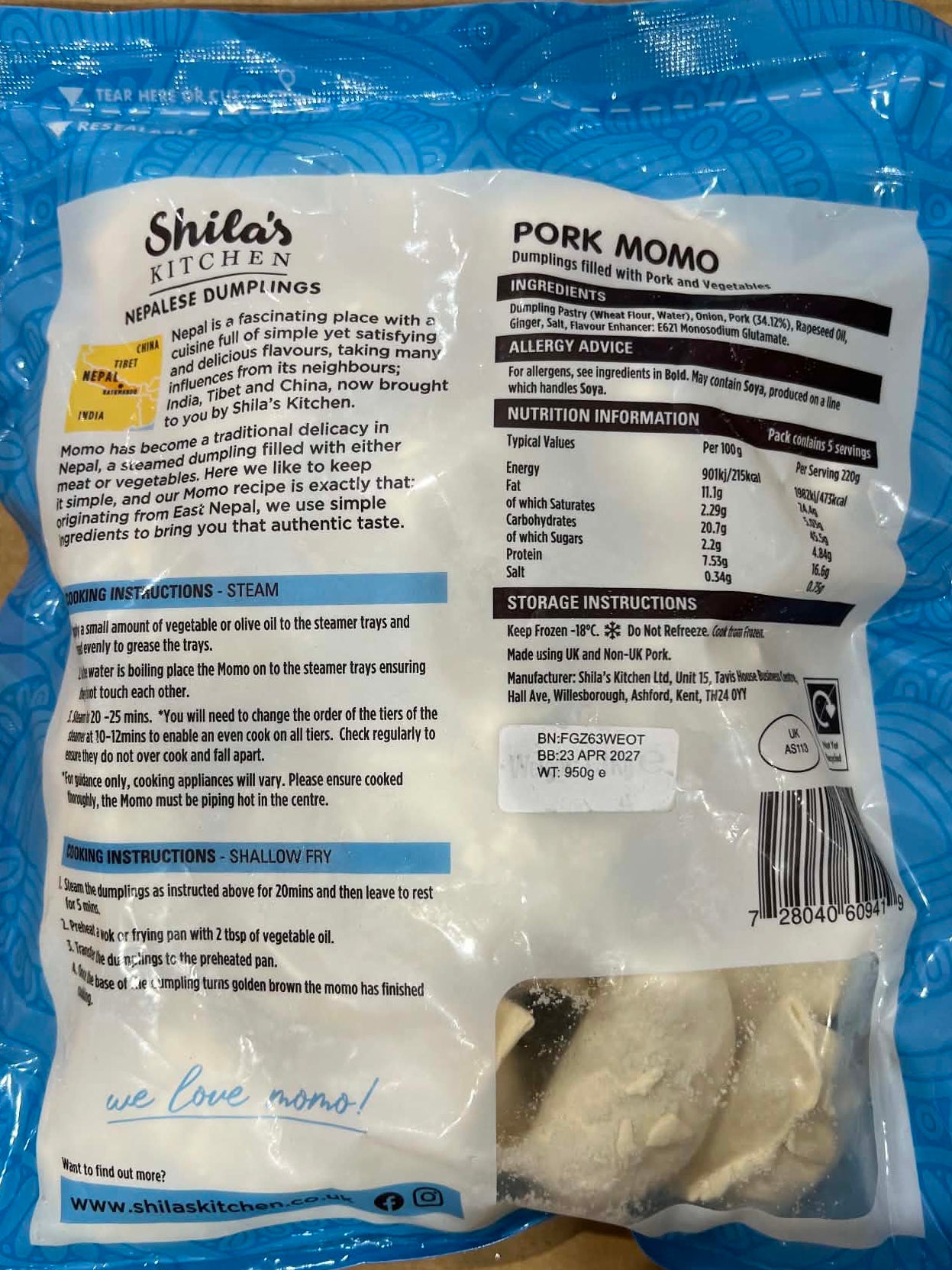 The back of a Shita's Kitchens PorkOMO smoked fish pouch, showing product details, instructions, and a photo of the raw smoked fish inside, placed on a wooden surface.