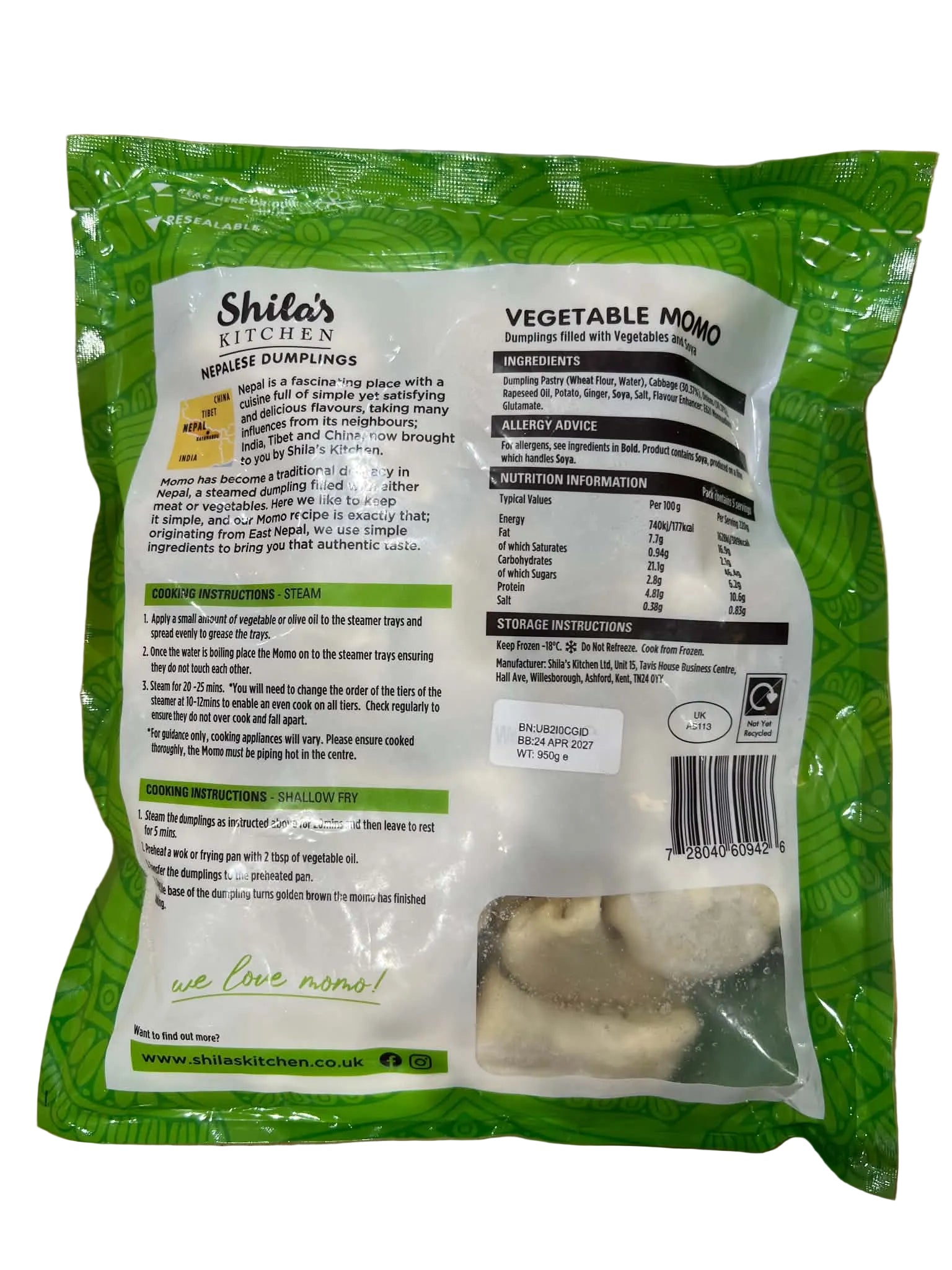 A bag of Shile's Kitchen Vegetable Mono mashed potatoes, showing the back of the packaging with product details, nutrition facts, and a clear window revealing the light beige potato chunks inside, set on a wooden surface.