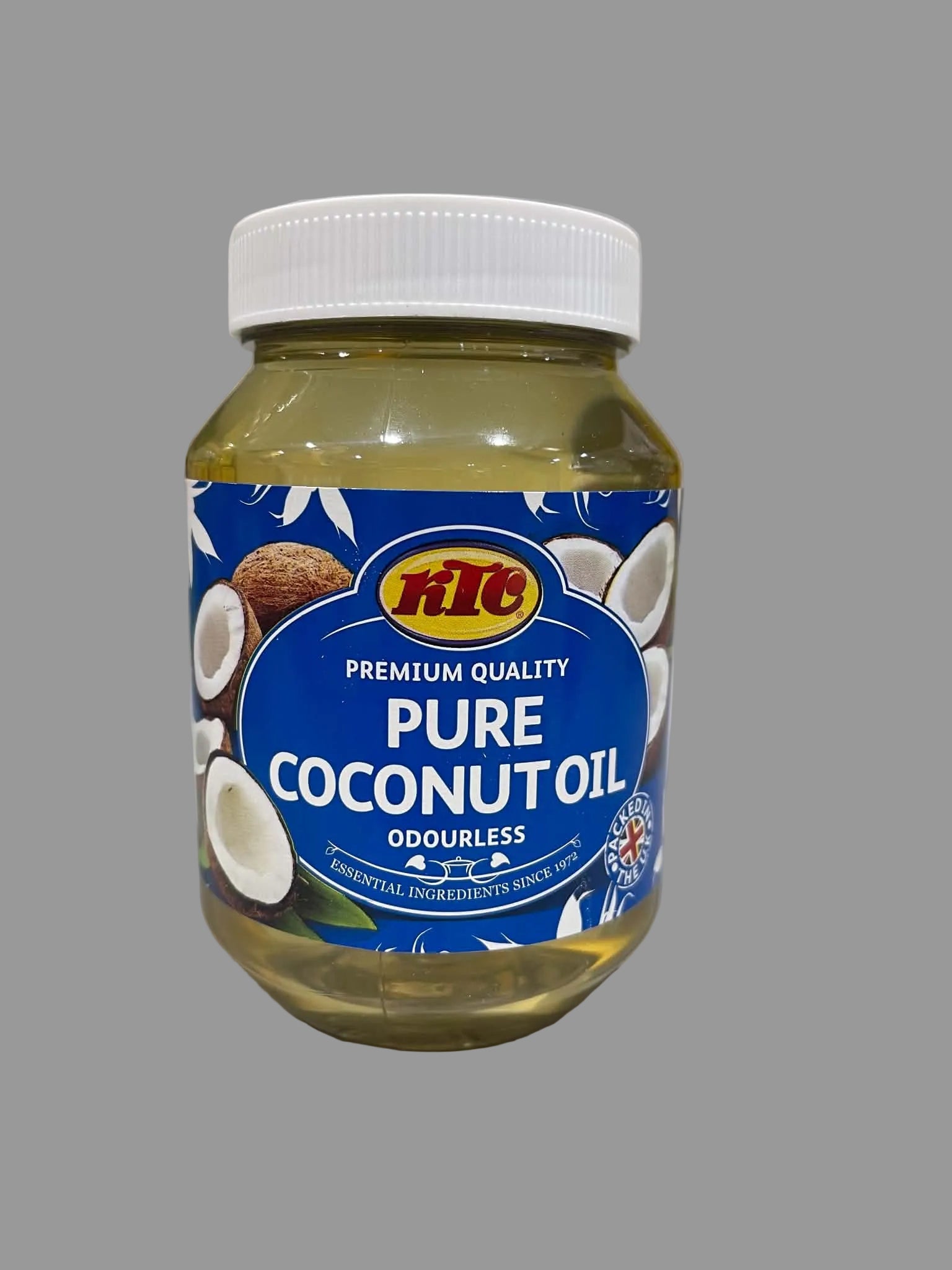 A jar of Fite Pure Coconut Oil with a blue and white label, placed on a light-colored countertop with a blurred kitchen background.
