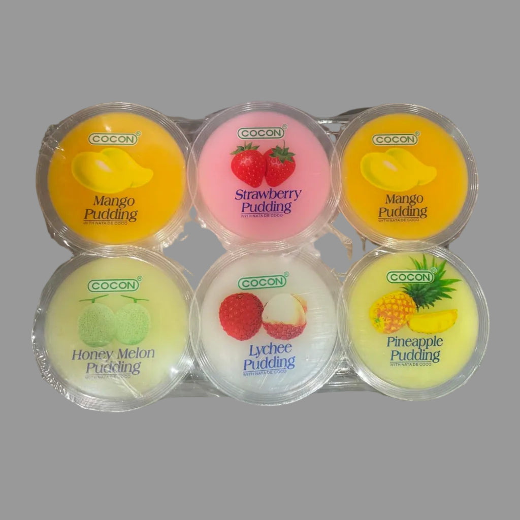 Six round plastic cups of COOCOON brand fruit pudding arranged in two rows on a gray surface. The puddings include Mango Pudding (yellow-orange), Strawberry Pudding (pink), Honey Melon Pudding (light yellow-green), Lychee Pudding (white with red fruit image), and Pineapple Pudding (yellow-green).